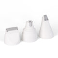 White grooming-kit trimmer attachments on a light background