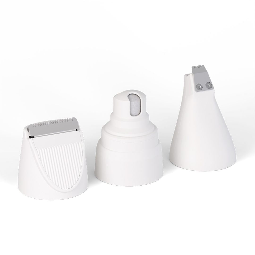 White grooming-kit trimmer attachments on a light background