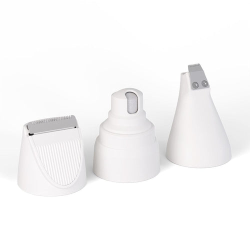 White grooming-kit trimmer attachments on a light background