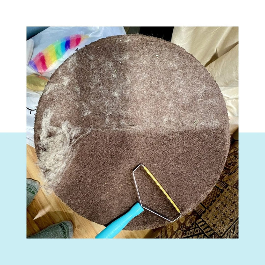 Deshedder brush used on a pet or fabric