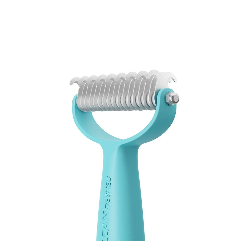 Deshedder brush and collected loose coat